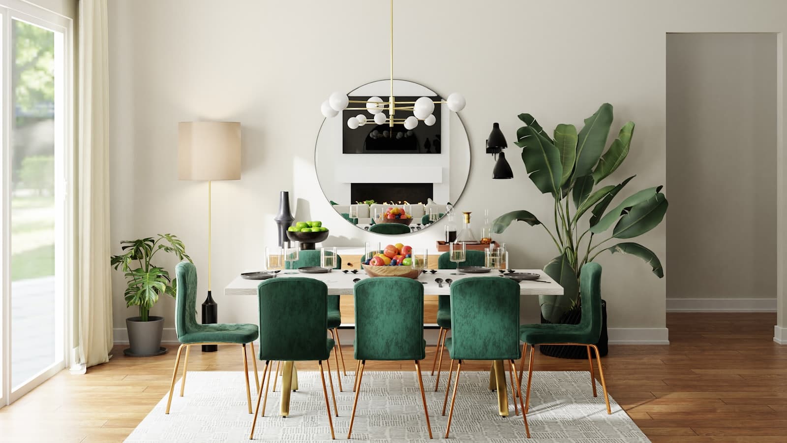 A freshly decorated dining room with soft bone walls, brass lighting and deep green velvet chairs.